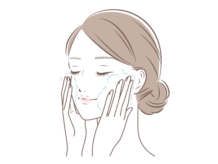 洗顔する女性